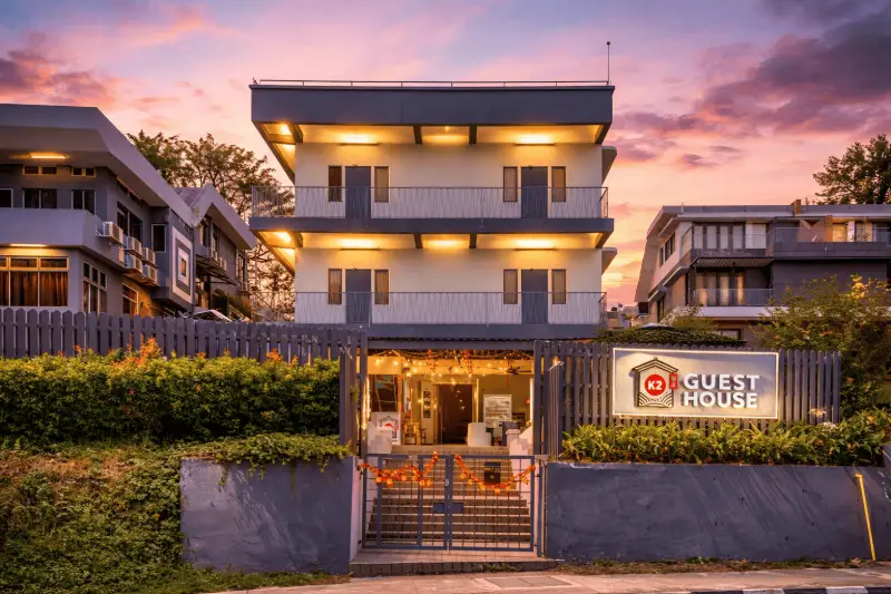The exterior of K2 Guesthouse at dusk